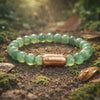 Magnet Green Aventurine Bracelet on a natural surface with sunlight and leaves, showcasing its gemstone beauty.