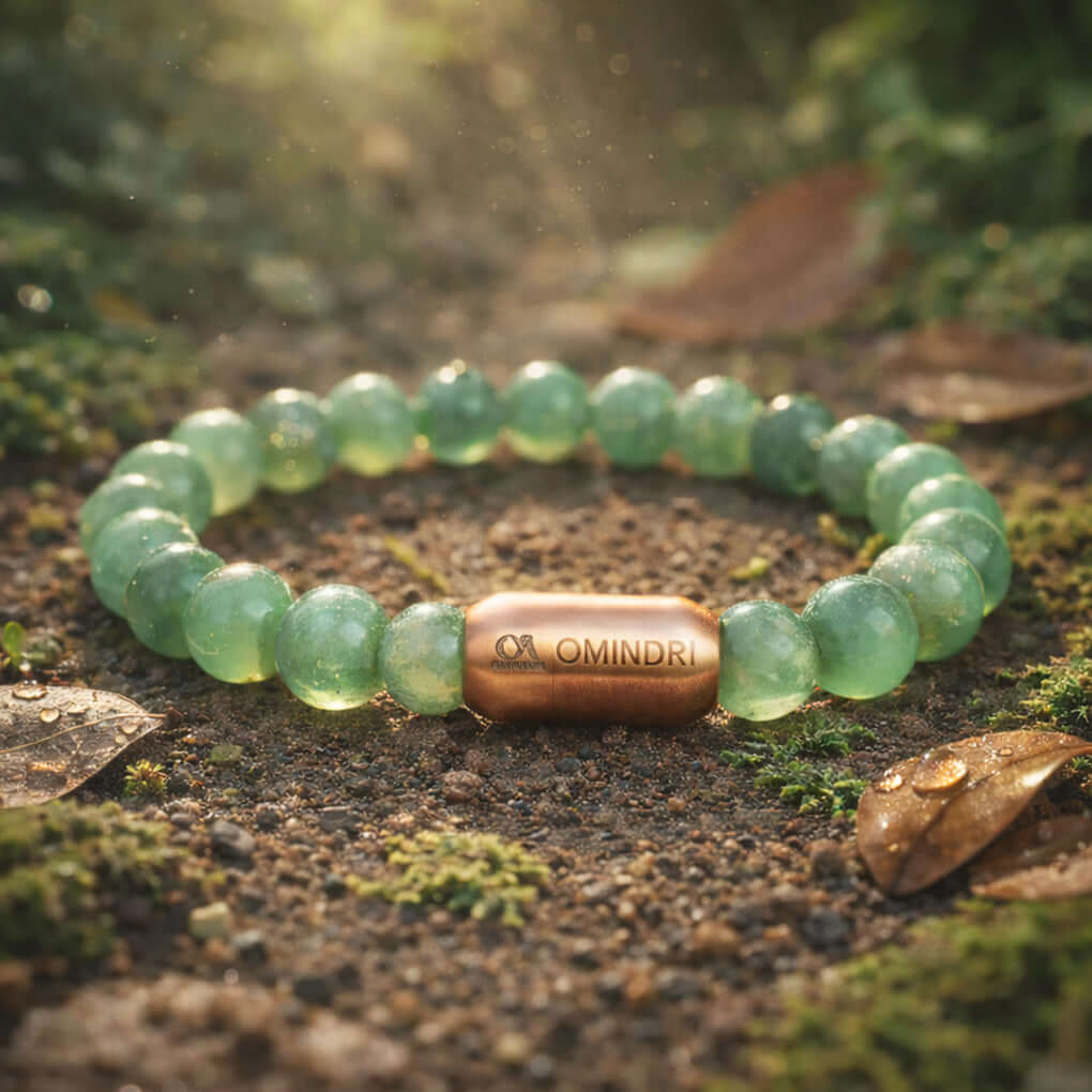 Magnet Green Aventurine Bracelet on a natural surface with sunlight and leaves, showcasing its gemstone beauty.
